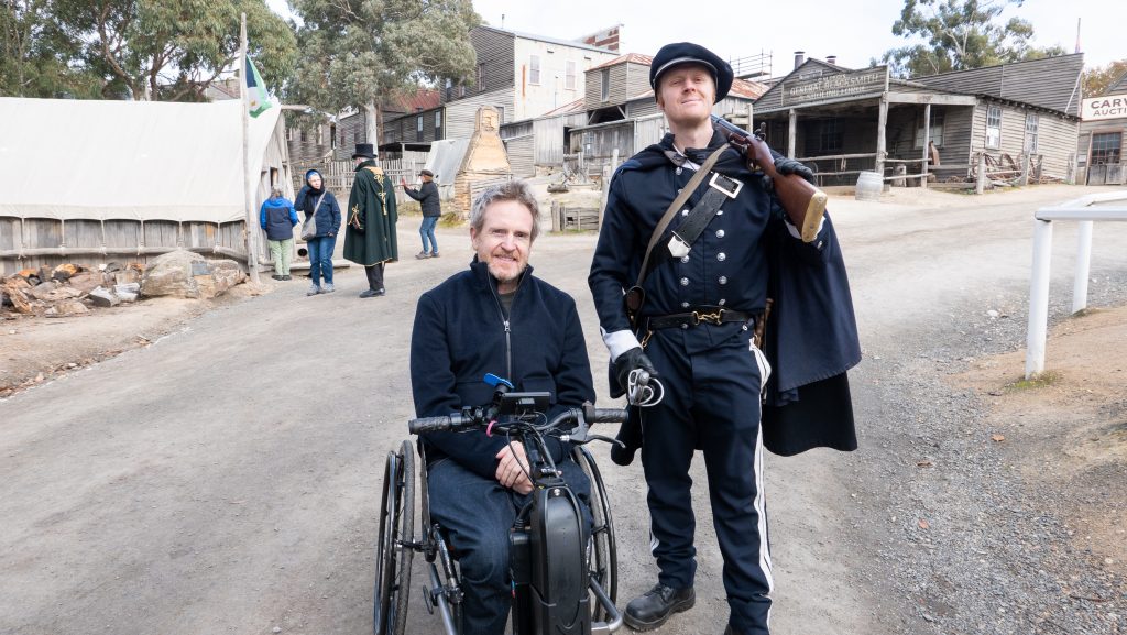 Ryan poses for a photo with one of Sovereign Hill's troopers on the diggings